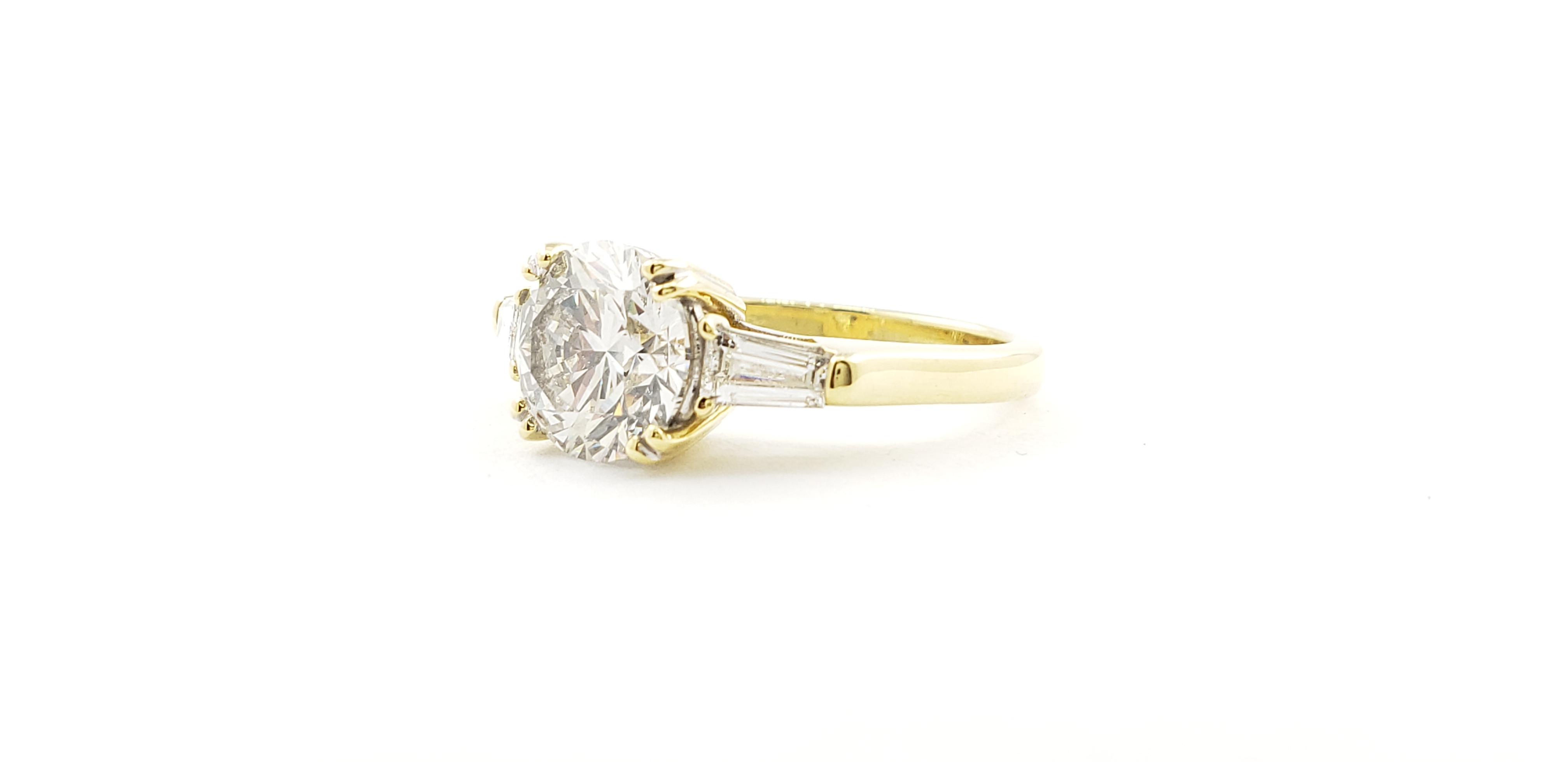 Three Stone Round & Baguette Diamond Ring
